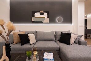 Exclusive Apartment | Living area | 55-inch Smart TV with cable channels