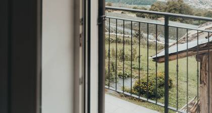 Quiet apartment surrounded by greenery, with views of the valley and sunset