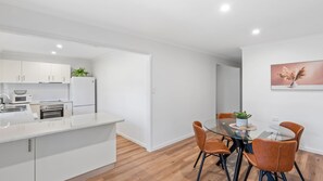 Fridge, microwave, oven, dishwasher - Renovated 3BR apartment with pool, WiFi, air-con & linen included, walking distance to beaches (Evans Head)