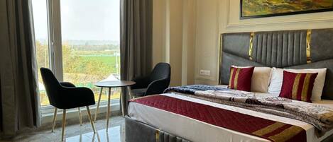 Standard Room | 1 bedroom, in-room safe, individually decorated, individually furnished