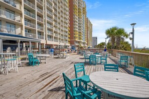 Outdoor dining - Bay Watch Condo with floor to ceiling windows | Bay Watch Resort - 1119 (North Myrtle Beach)