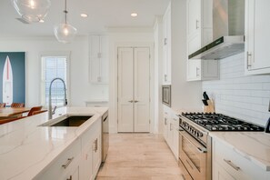 Full-size fridge, microwave, oven, stovetop - Beach House - Whale Rested by PHG (Panama City Beach)
