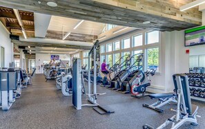 A gym with cardio machines, weight stations, and dumbbells. - Bayside Resort * New Listing * 5BR home w 2  Maste (Selbyville)