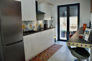 City kamer | Gemeenschappelijke keuken | Een waterkoker