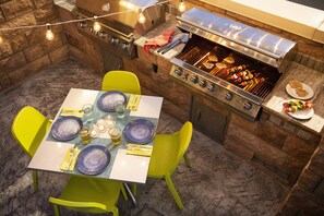 Outdoor dining - Home2 Suites By Hilton Winter Garden (Winter Garden)