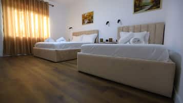 Family Room, 1 Bedroom | Premium bedding, memory foam beds, minibar, individually decorated