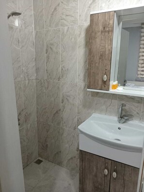 Exclusive Quadruple Room | Bathroom | Slippers - Taksim City Suite (Istanbul)