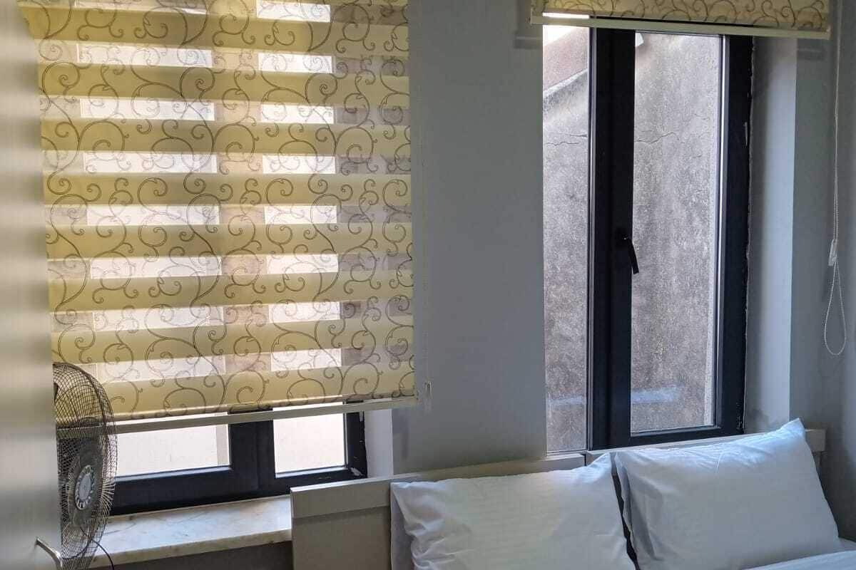 Quarto casal executivo | Cortinas blackout, ferros/tábuas de passar roupa, Wi-Fi de cortesia