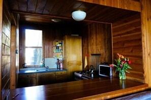 Fridge, stovetop, dining tables