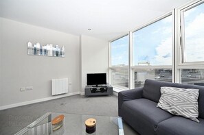 Panoramic Apartment, 2 Bedrooms, 2 Bathrooms, River View | Living area | Flat-screen TV