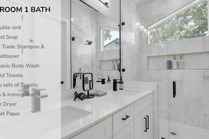 Shower, hair dryer, towels