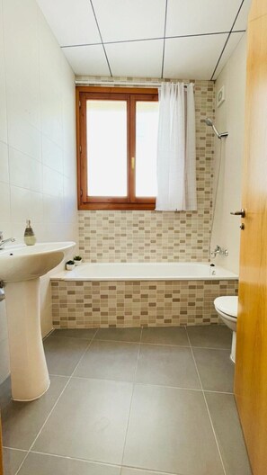 Hair dryer, bidet, towels, soap