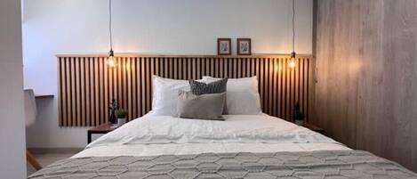 2 habitaciones, caja de seguridad en la habitación y escritorio