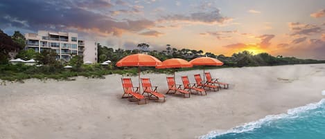 On the beach, sun-loungers, beach towels