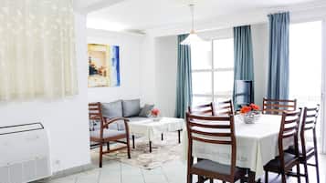 Familienapartment | Wohnbereich | Flachbildfernseher