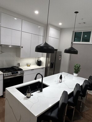 Fridge, microwave, oven, stovetop - Rooftop City Views + Firepit • BeltLine Access • 3BR Townhome • Private Garage (Atlanta)