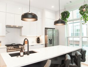 Fridge, microwave, oven, stovetop - Rooftop City Views + Firepit • BeltLine Access • 3BR Townhome • Private Garage (Atlanta)