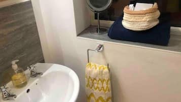 Hair dryer, towels, soap, toilet paper