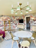 Honeymoon Room | Living area | 50-inch Smart TV with digital channels, pay movies, streaming services