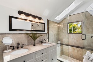 Shower, eco-friendly toiletries, hair dryer, towels