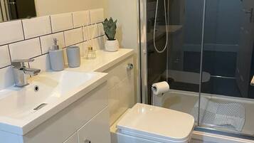 Hair dryer, towels, soap, toilet paper