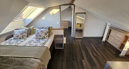 Attic Floor With Views Over Fields and sea