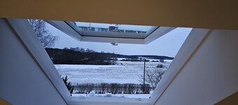 Attic Floor With Views Over Fields and sea