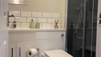 Hair dryer, towels, soap, toilet paper