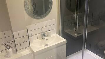 Hair dryer, towels, soap, toilet paper