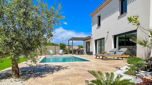 A modern house with a swimming pool, outdoor seating, and a pergola. - Gorgeous home in Rochegude with private swimming pool, can be inside or outside (Rochegude)