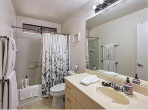 Hair dryer, towels, soap, toilet paper