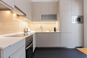 Duplex família, 3 quartos, sacada, vista para o rio | Cozinha privada
