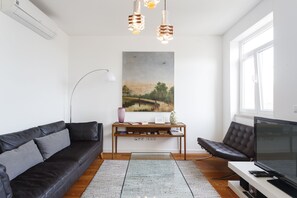 Family Apartment, 2 Bedrooms, Balcony, River View | Living area | 20-inch LCD TV with cable channels - Cortes Apartment in Lisbon Historic Neighborhood (Lisbon)