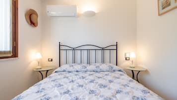 3 slaapkamers, een strijkplank/strijkijzer, beddengoed