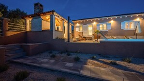 A residential property with a swimming pool, outdoor seating area, and a staircase leading to a covered patio. - Gorgeous home in Zaboric with private swimming pool, can be inside or outside (Zaboric)