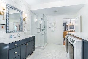 Shower, hair dryer, towels