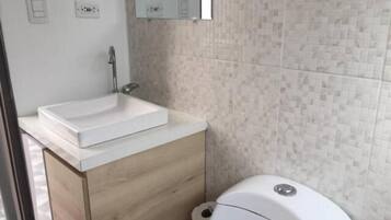 Shower, towels, soap, toilet paper