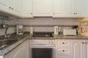 Fridge, microwave, oven, coffee/tea maker