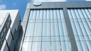 A modern building with a 'bobobox' sign and a slogan 'Sleep Better Worry Less'. - Bobopod Kebayoran Baru Jakarta (Jakarta)