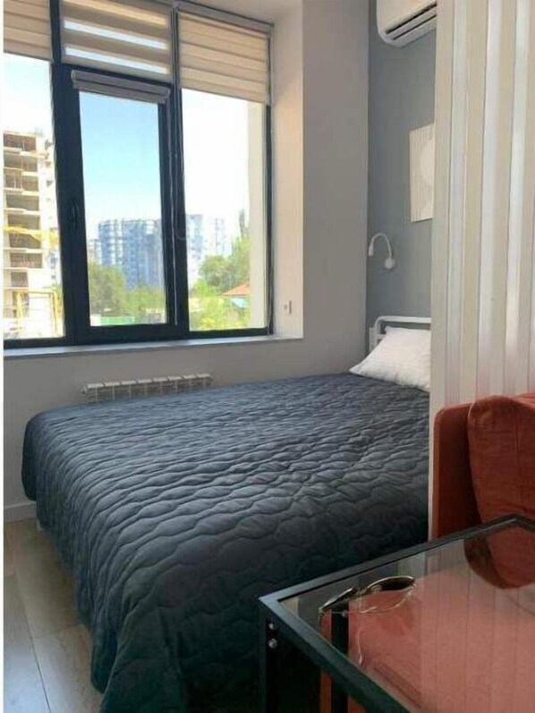 1 غرفة نوم ومكواة/لوح كي وواي فاي وملاءات أسرّة