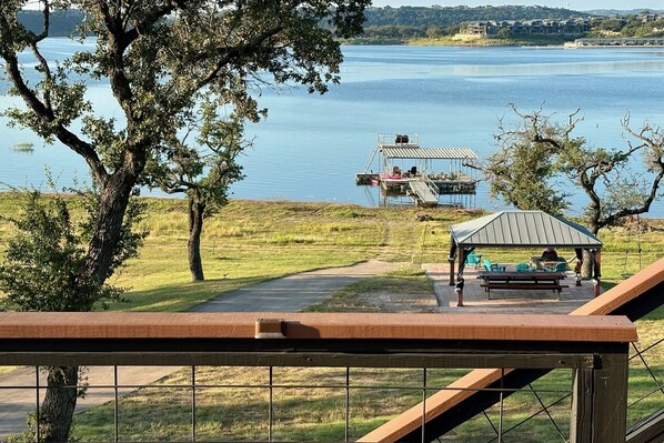 Property grounds - Waterfront home w/open layout kitchen, lg deck, W/D, Private dock with kayaks, (Lago Vista)