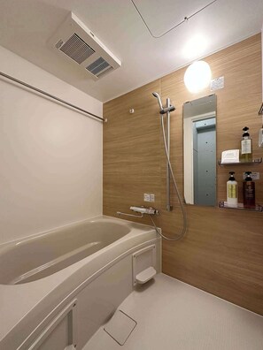 Dutxa, assecador de cabells i tovalloles 