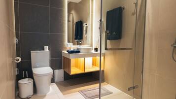 Double Room, City View | Bathroom | Shower, free toiletries, hair dryer, slippers
