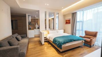 Junior Suite | Desk, laptop workspace, blackout curtains, iron/ironing board