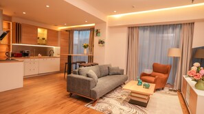 Superior Suite | Living area | Flat-screen TV - May Seven Service Apartment (Ulaanbaatar)