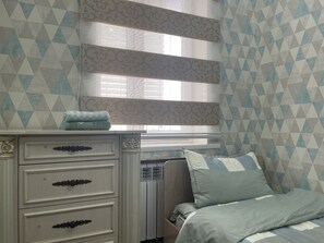 1 slaapkamer, een strijkplank/strijkijzer, wifi, beddengoed