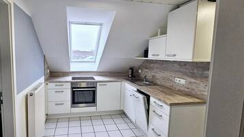 Refrigerador, horno, placa de cocina, lavavajillas