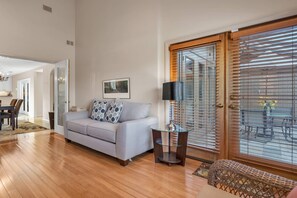 TV, fireplace, books, offices - Extended Stay Golf Retreat | Office & Screened Lanai | 30-Night Minimum | Saddlebrook Resort (Zephyrhills)