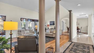 Smart TV, fireplace, books, offices