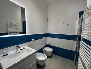 Ducha y secador de pelo